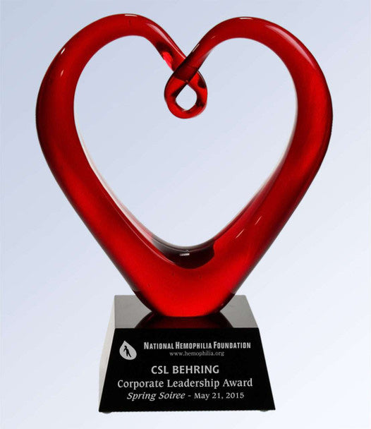 The Red Whole Heart Art Glass  w/ Black Base.